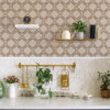 florence rust wallpaper with cream background and rust striking pattern used in kitchen above the splashbacks