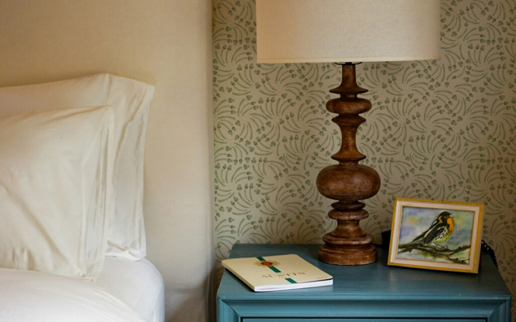 Elsie sage sustainable Wallpaper used on wall in Bedroom.Part of our home decor collection The Portrait Collection.